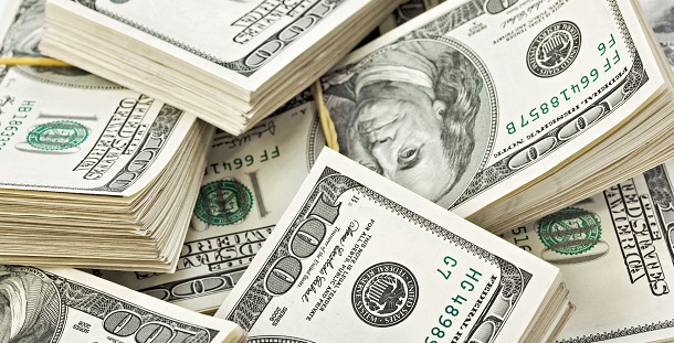 Many  bundle of US 100 dollars bank notes