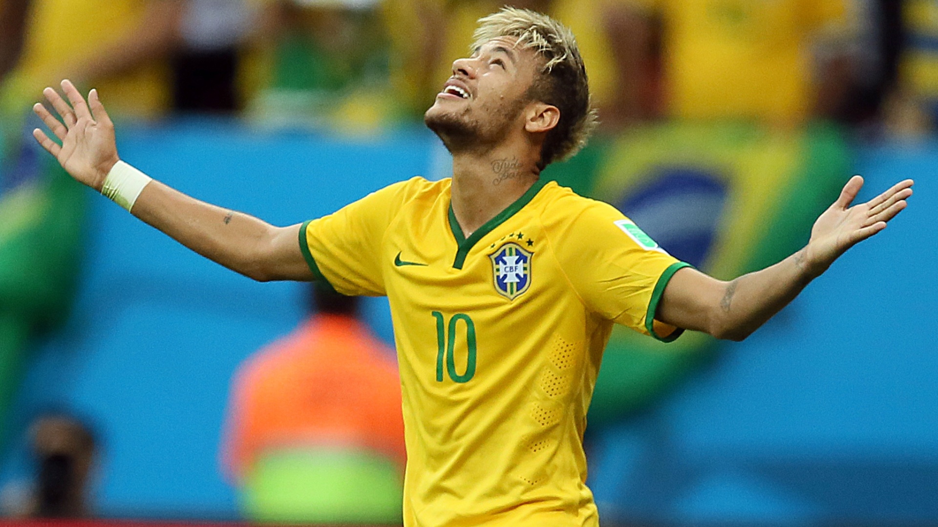 neymar-comemora-apos-marcar-seu-segundo-gol-no-jogo-e-colocar-o-brasil-novamente-na-frente-do-placar-contra-camaroes-1403556239776_1920x1080